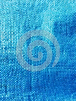 Blue plasticÃ¢â¬â¹ woven sack textureÃ¢â¬â¹